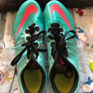 Blue and pink women’s track spikes rival s